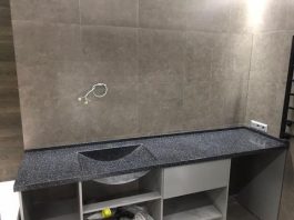 Столешницы из искусственного камня в ванной: стиль, практичность и долговечность